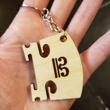 Bridge keychain with cut-out alto clef